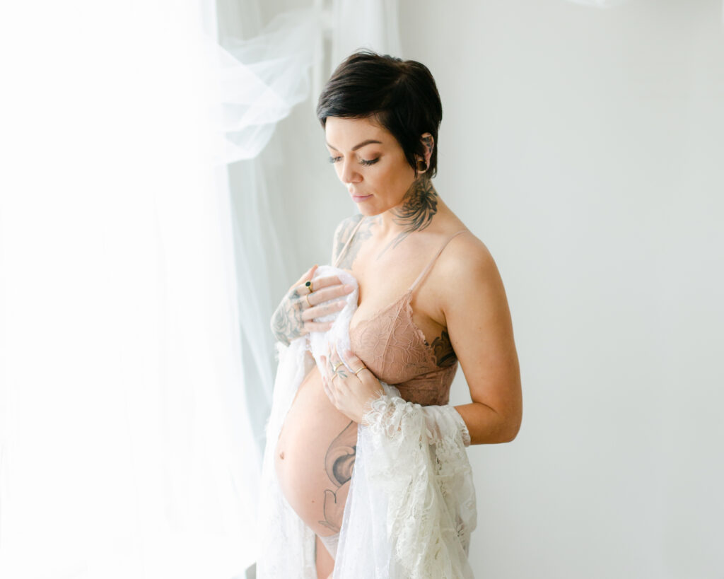 pregnant woman boudoir style maternity photo, naked belly with sheer robe by dc maternity photographer-17