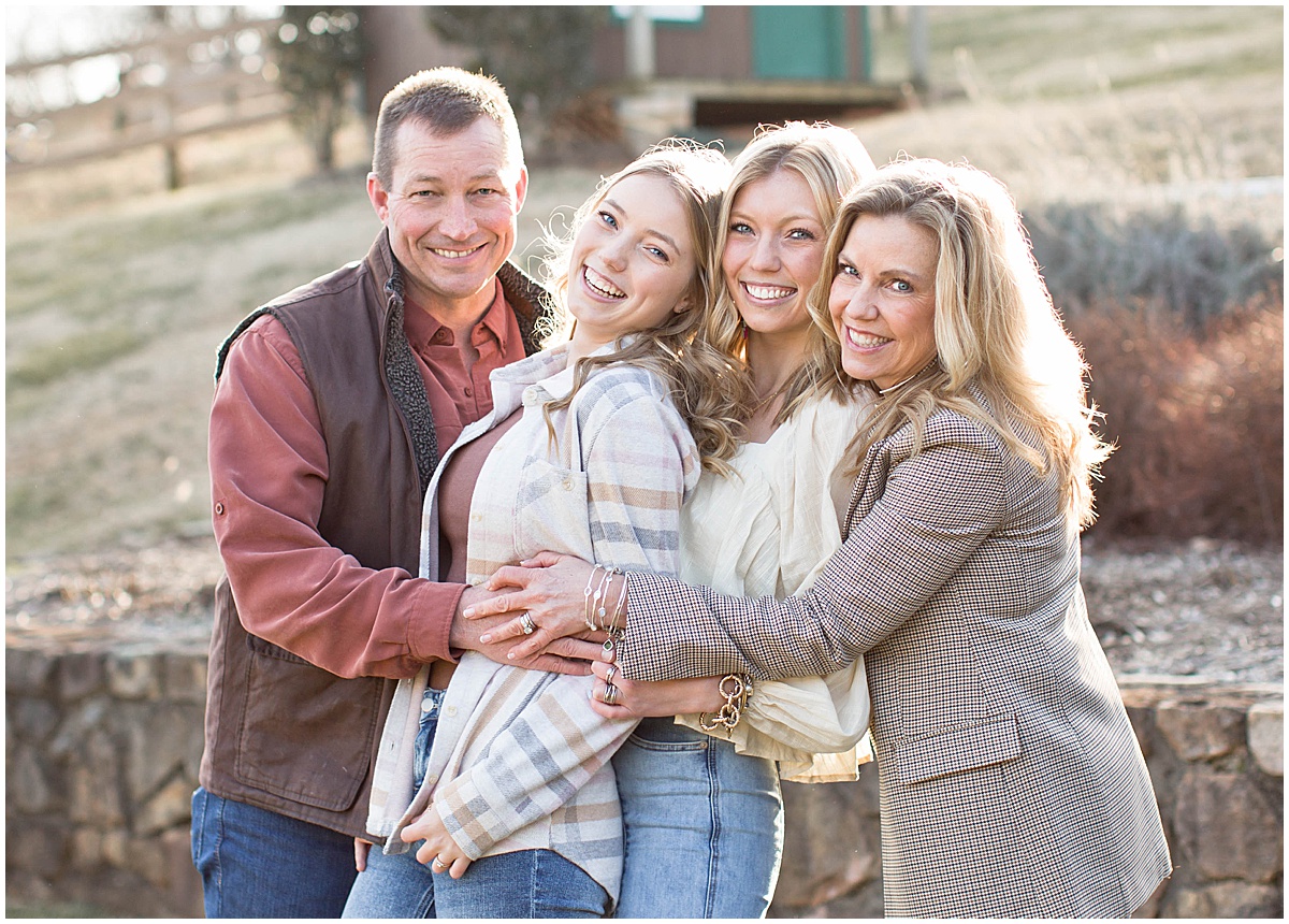 outdoor winter family photos of mom, dad and 2 daughters